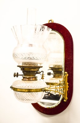 Lot 20 - A 19th century wall mounted cut glass oil lamp...