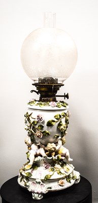 Lot 25 - A 19th century Sitzendorf duplex oil lamp, the...