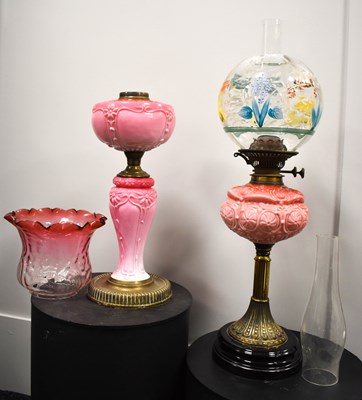 Lot 23 - Two vaseline glass Victorian oil lamps in...