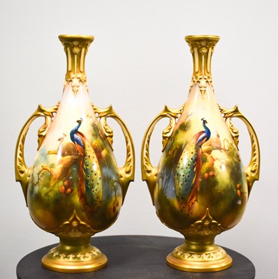 Lot 80 - A pair of Royal Worcester vases decorated with...