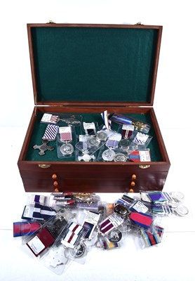 Lot 374 - A wooden collectors box with three drawers...