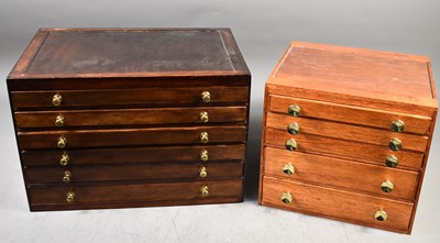 Lot 375 - Two wooden collectors chests containing a...
