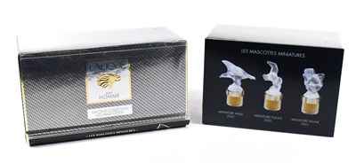 Lot 106 - Two Lalique miniature perfume bottle sets:...
