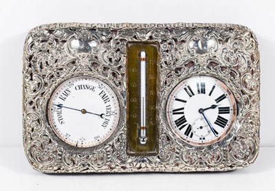 Lot 194 - A Victorian silver mounted desktop clock,...