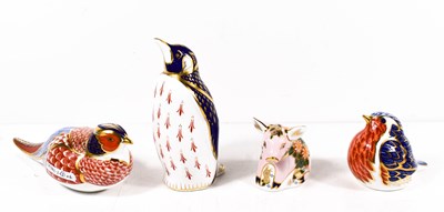 Lot 104 - A group of four Royal Crown Derby paperweight...