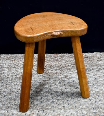 Lot 579 - Robert Thompson the Mouseman: an oak stool,...