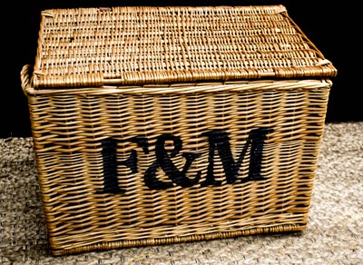 Lot 561 - A Fortnum and Mason wicker large picnic basket...