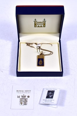 Lot 317 - A Royal Mint 9ct gold ¼ oz ingot with a...