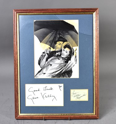 Lot 420 - Autographs of Gene Kelly and Debbie Reynolds,...