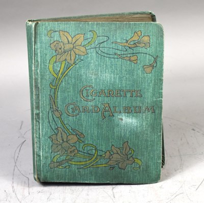 Lot 416 - A vintage cigarette card album containing...