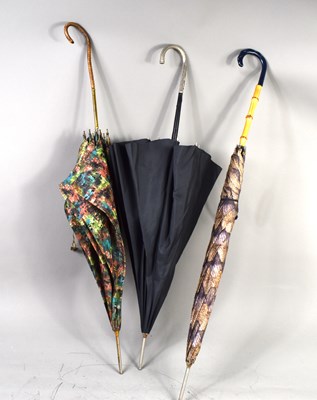 Lot 368 - Three vintage umbrellas, one with rattan...
