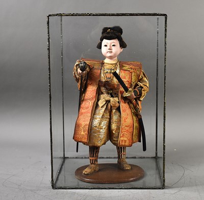Lot 139 - A Japanese cased model Momotaro (Peach Boy),...