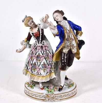 Lot 41 - A Sitzendorf figure group modelled as gallant...