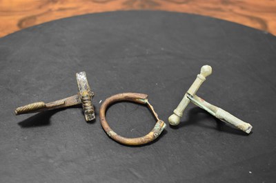 Lot 383 - A Roman bronze fibula brooch complete with pin,...