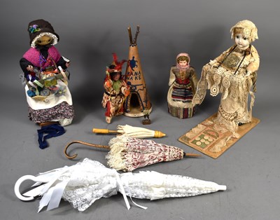 Lot 349 - Two dolls parasols, a model lace seller,...