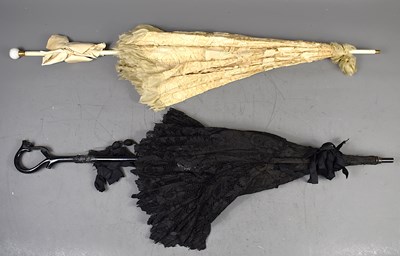 Lot 360 - A late Victorian mourning parasol, lace with...
