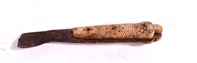 Lot 365 - An ancient bone handled knife, the handle with...