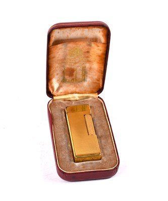 Lot 378 - A vintage Dunhill Rollagas lighter, gold tone,...
