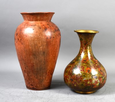 Lot 141 - A teracotta vase with a rustic red glaze and...