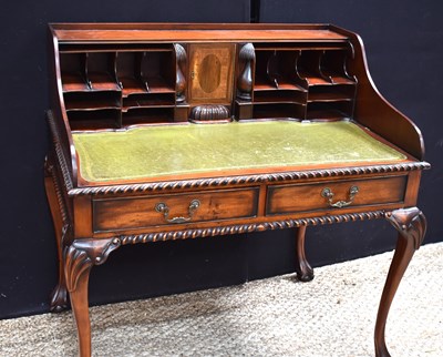 Lot 567 - An early 20th century Chippendale style...