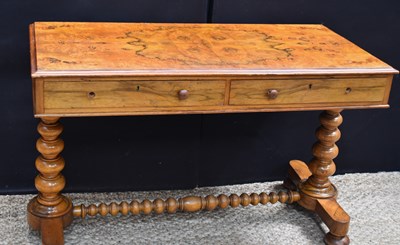 Lot 568 - A Victorian library table, with two drawers,...