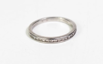 Lot 10 - A Tiffany & Co. platinum and diamond half hoop...
