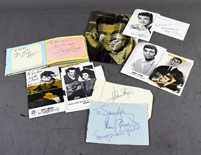 Lot 394 - An autograph book containing the signatures of...
