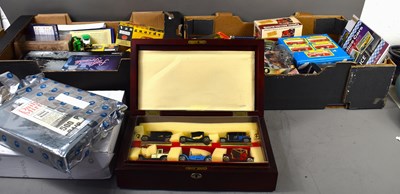 Lot 315 - A large group of boxed die cast vehicles to...