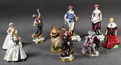 Lot 224 - A group of porcelain figures to include Royal...
