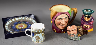 Lot 169 - A group of three character jugs comprising...