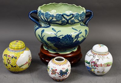 Lot 354 - A Chinese twin handled celadon green and blue...