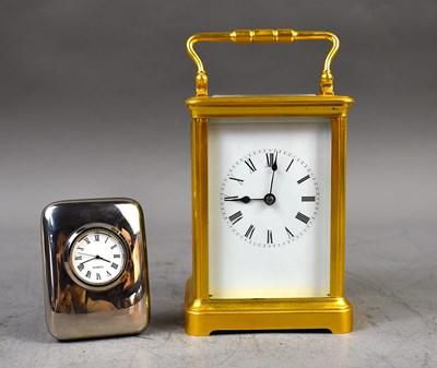 Lot 175 - A 20th century English brass cased carriage...
