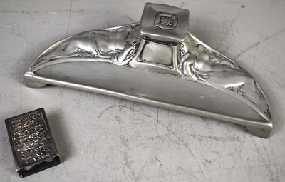Lot 525 - A vintage pewter matchbox holder featuring a...