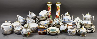 Lot 195 - A group of Japanese porcelain tea sets to...