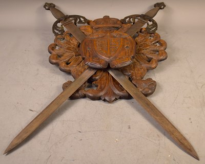Lot 364 - A Spanish carved wooden coat of arms wall...