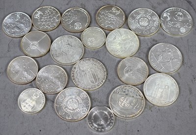 Lot 54 - A group of Portuguese silver coins to include...
