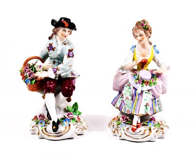Lot 198 - A pair of German Sitzendorf porcelain figures...