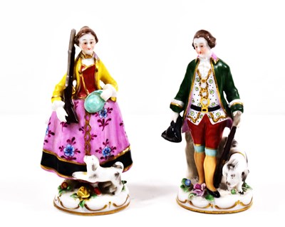 Lot 199 - A pair of German porcelain figures of a...