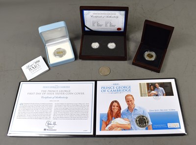 Lot 40 - A group of silver coins to include 1oz silver...