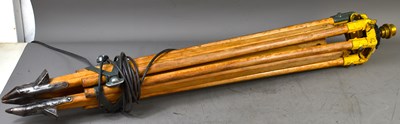 Lot 503 - A vintage wooden surveying tripod converted...