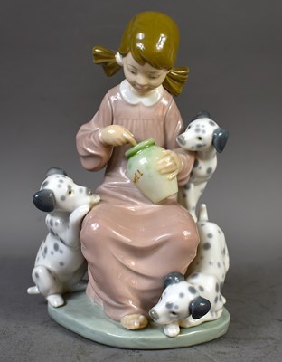 Lot 241 - A Lladro porcelain figure, depicting a young...