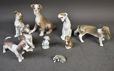 Lot 221 - A group of Lladro porcelain dog figures to...
