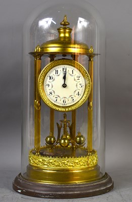 Lot 177 - A German torsion clock, brass framework,...