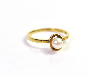 Lot 52 - A 9ct gold and pearl ring, size M/L, 1.3g.