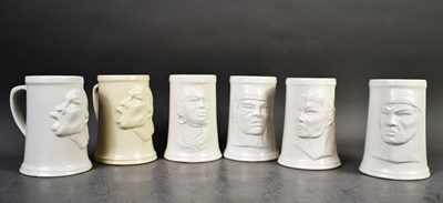 Lot 183 - A set of Venezuelan porcelain tankards,...