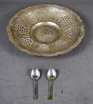 Lot 120 - A white metal dish with engraved and pierced...