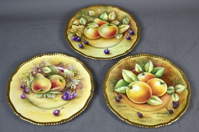 Lot 219 - A group of three Coalport cabinet plates hand...