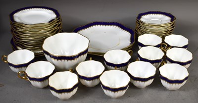 Lot 185 - A Coalport porcelain part tea service in the...
