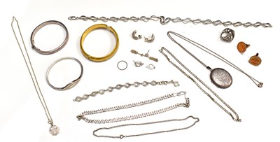 Lot 53 - A group of silver to include a bangle, photo...