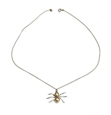 Lot 19 - A silver and pearl spider pendant necklace.